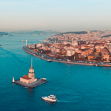 tower on sea with city view surrounded with sea